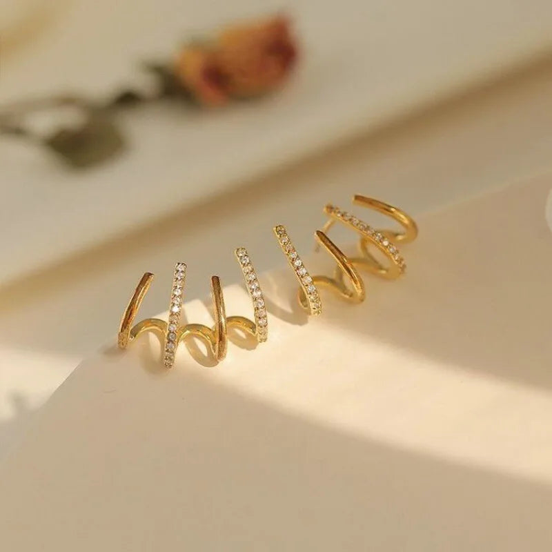 Vridne Øreringe | Elegant Design | Guld eller Sølv