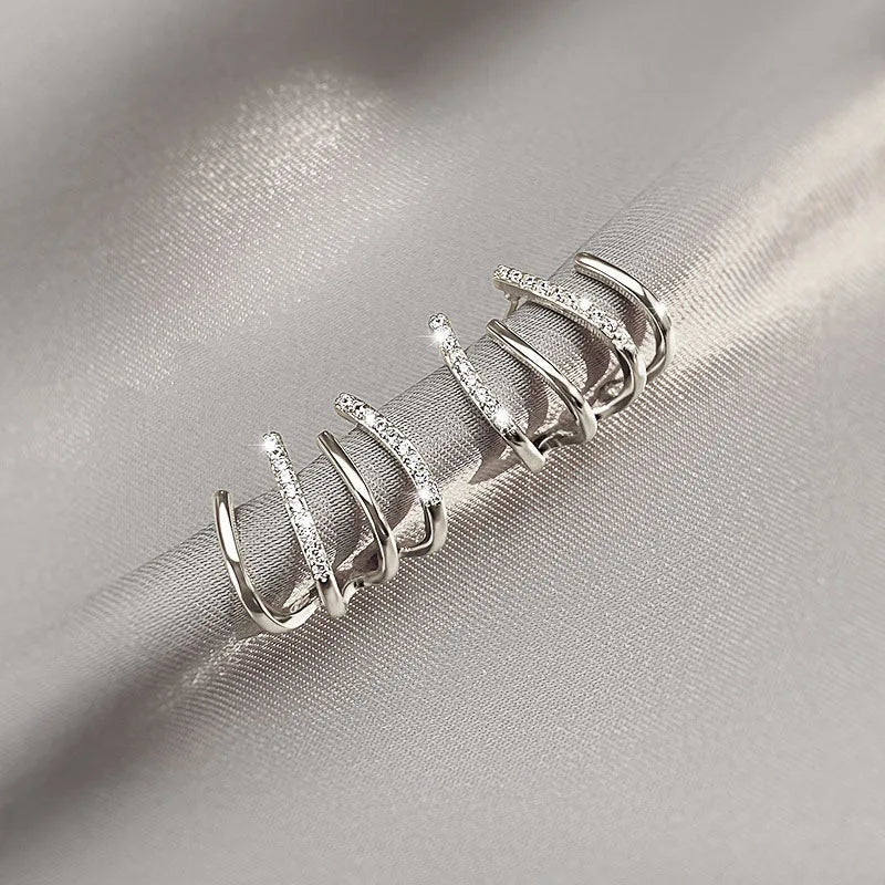 Vridne Øreringe | Elegant Design | Guld eller Sølv