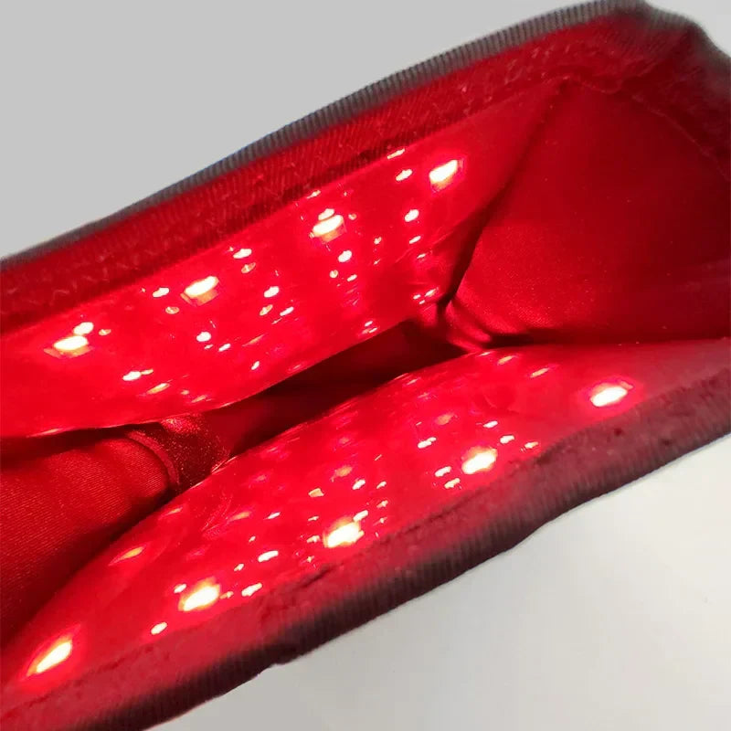 Lumera Handske til Lindring af Hånd- og Ledpine ved Brug af Rødt Lys